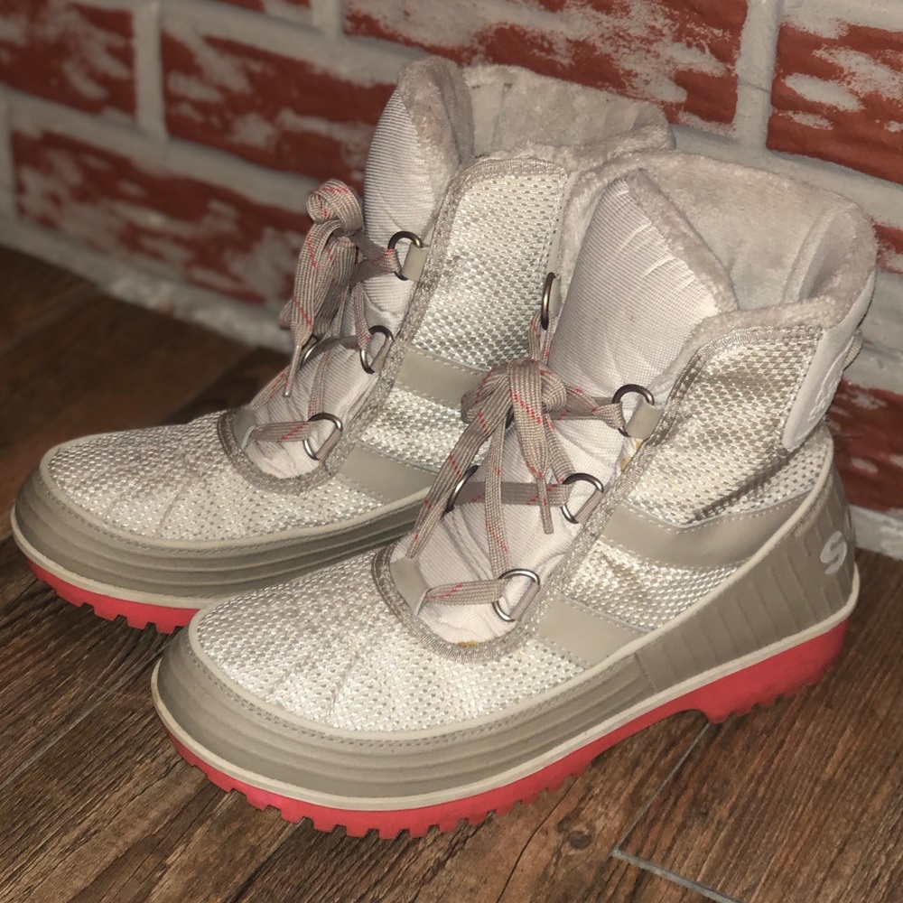 Sorel. Winter boot. Size 9. Cream with coral soles.